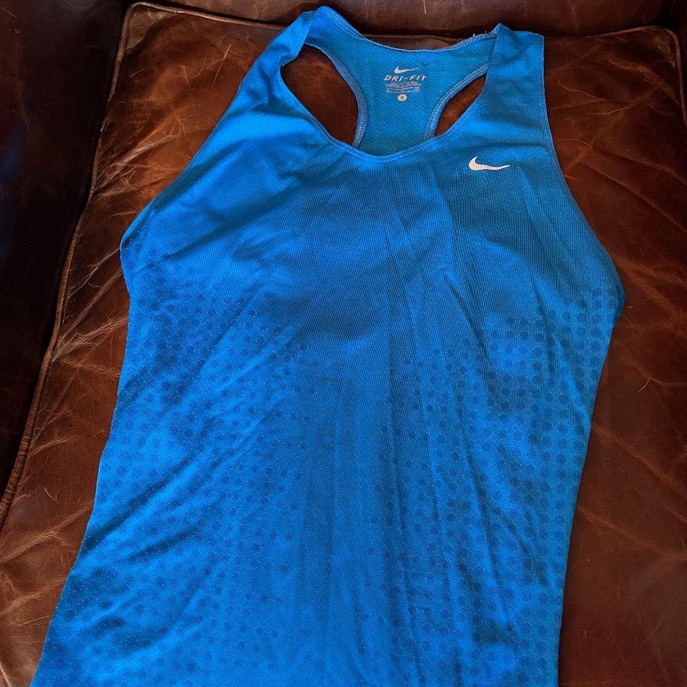 Nike blue tank top -- straps in back drop a bit to open the back some. Flat